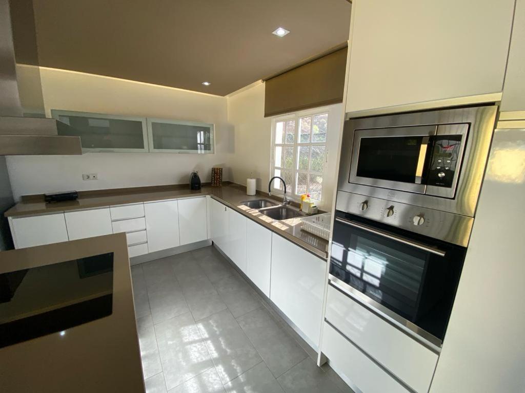 Sunny Carmelito Deluxe Apartment Mogan Luaran gambar